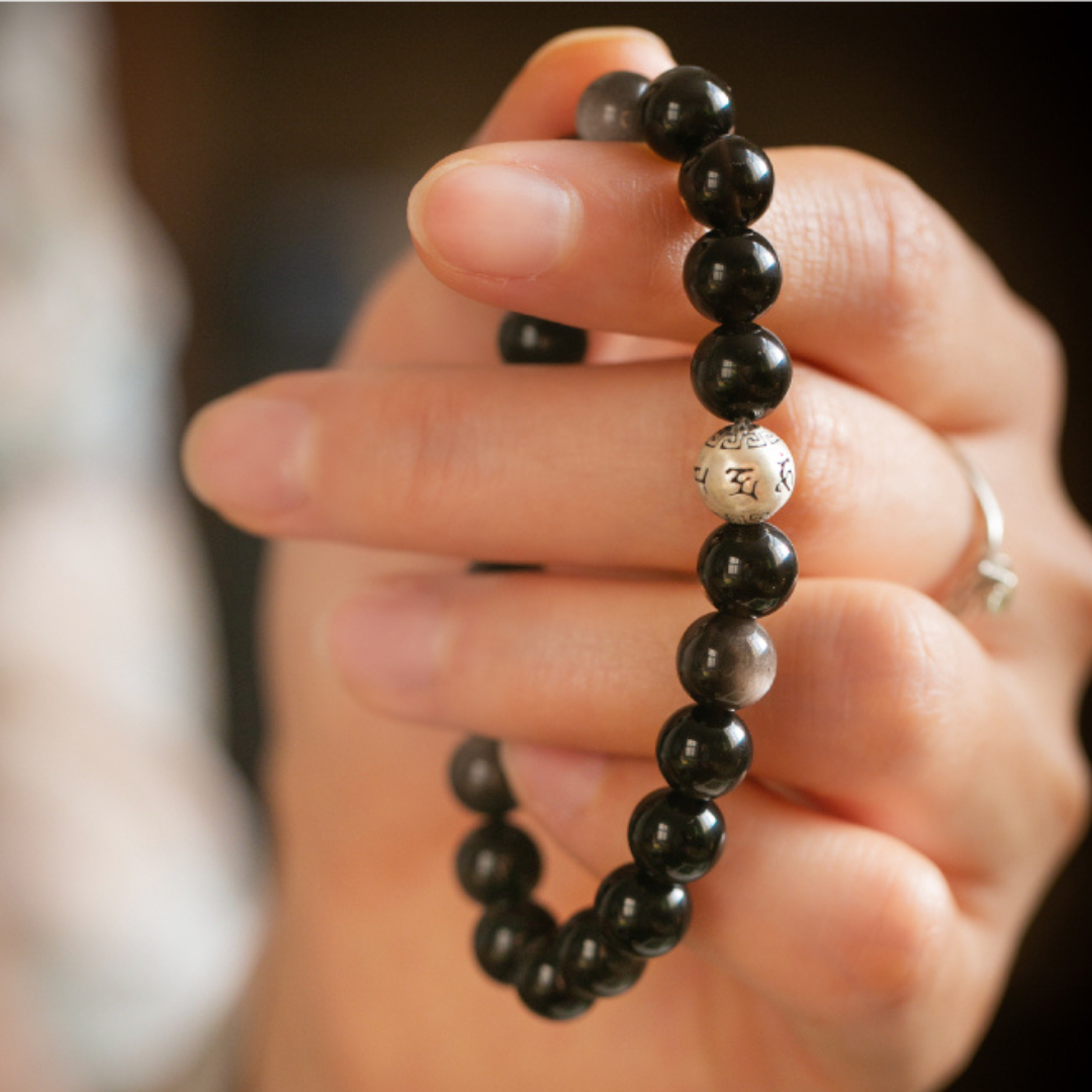 This silver obsidian bracelet allows you to bring your own protective barrier
